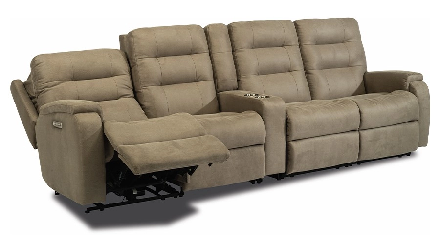 A beige reclining sofa with three cushioned seats, featuring an extended footrest on one seat and a center console with cup holders. Cozy and inviting.