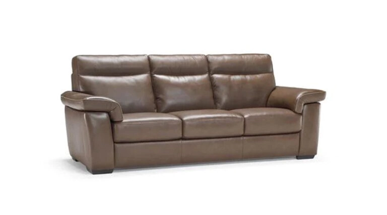 A brown leather sofa with three cushioned seats and wide armrests, exuding a sense of comfort and elegance. Its smooth texture adds a modern touch.