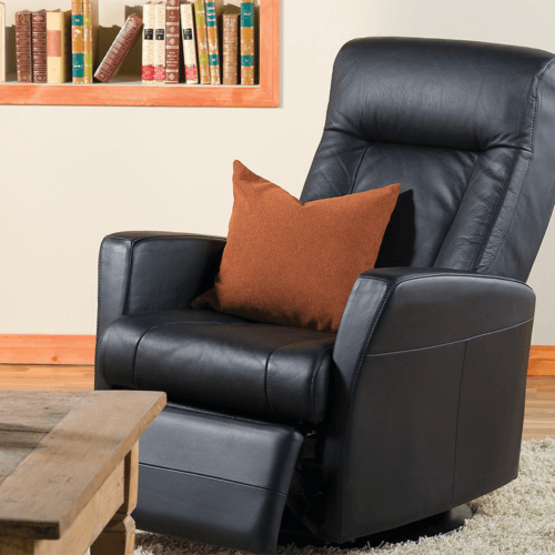 Gray L-shaped sectional sofa with plush cushions and low-profile design on dark wooden legs. Modern and comfortable, conveying a relaxed ambiance.