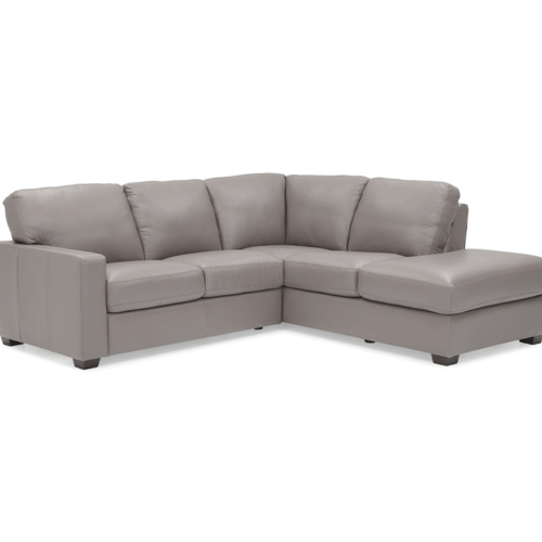 Gray L-shaped sectional sofa with plush cushions and low-profile design on dark wooden legs. Modern and comfortable, conveying a relaxed ambiance.