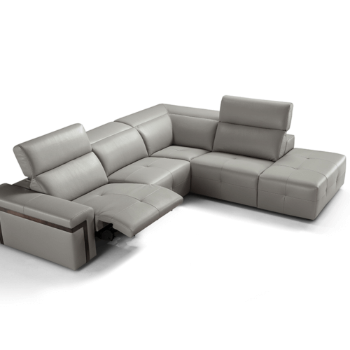 A sleek, modern black leather swivel chair with curved arms and white stitching sits on a tiled floor. The setting is minimalist and stylish.